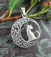 Cat Silhouetted Against a Fanciful Swirl Crescent Moon Pendant